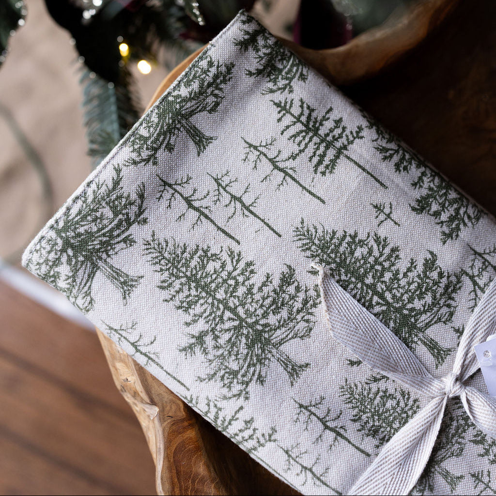 Evergreen tree table runner on wood table