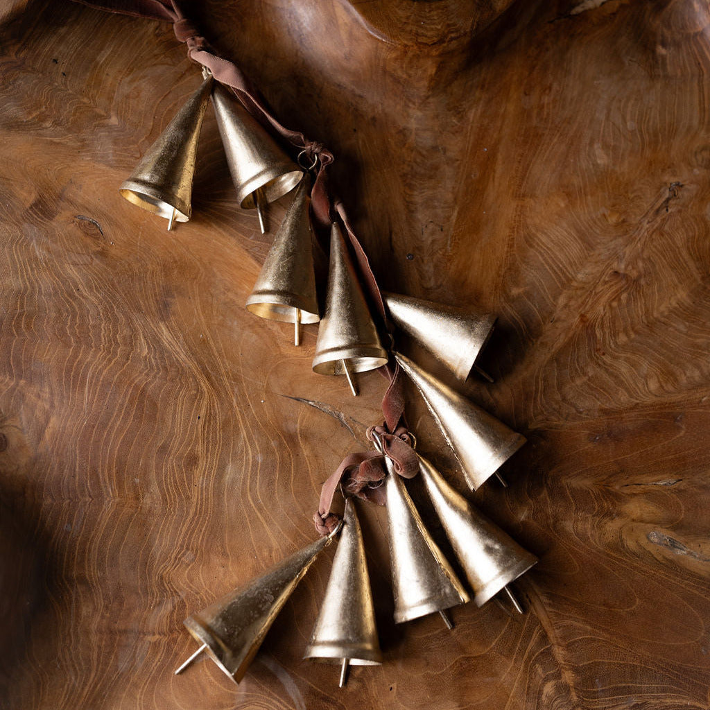 10 bells hanging on velvet rope